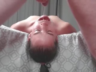Upside down piss loving whore laying face down from bed swallows piss in two non identical camera angles